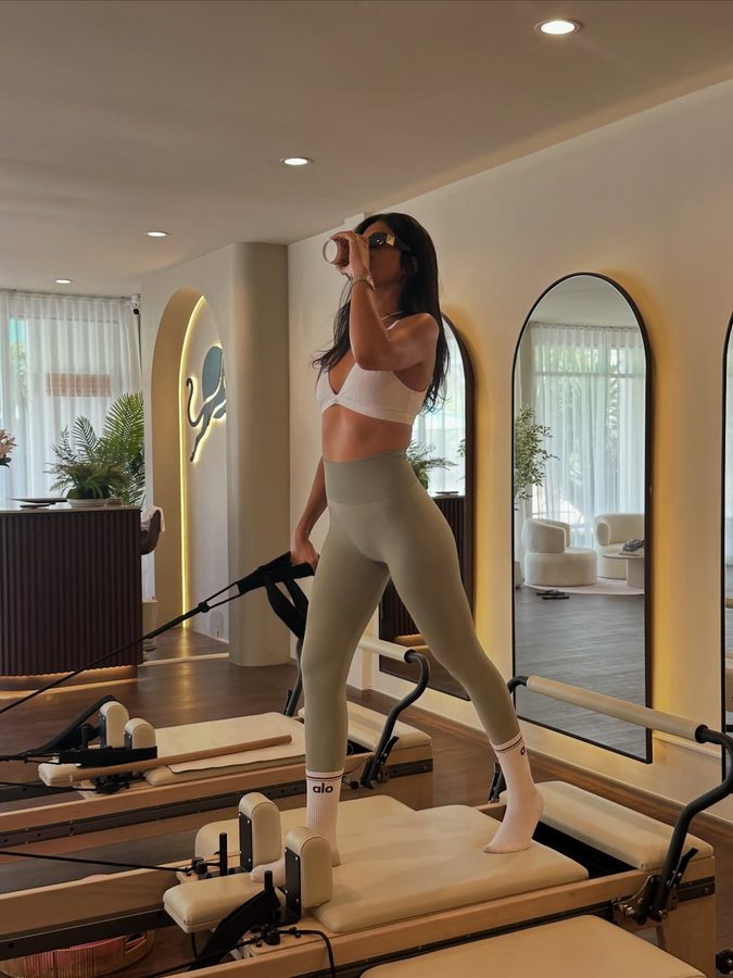 Yarden practicing Pilates on a Reformer in the Panthera Pilates Phuket studio
